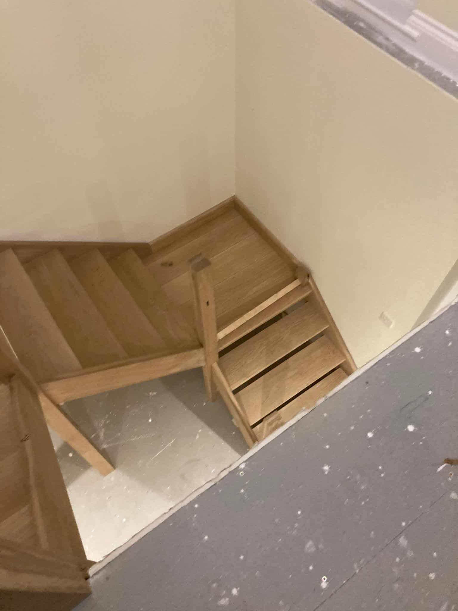 Wooden staircase installation by JB Carpentry & Construction, expert carpentry and construction services in UK.