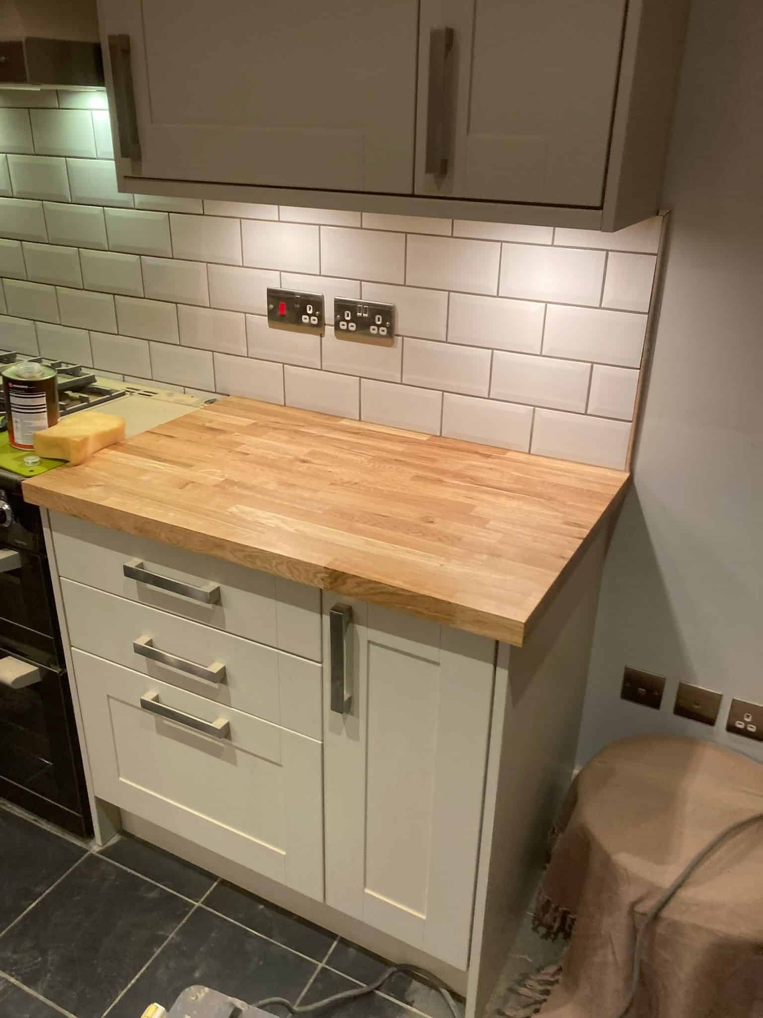 Efficient kitchen carpentry and construction services with custom timber countertops.