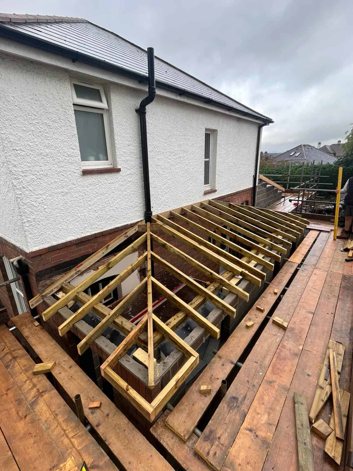Timber decking construction on a residential property by JB Carpentry & Construction.