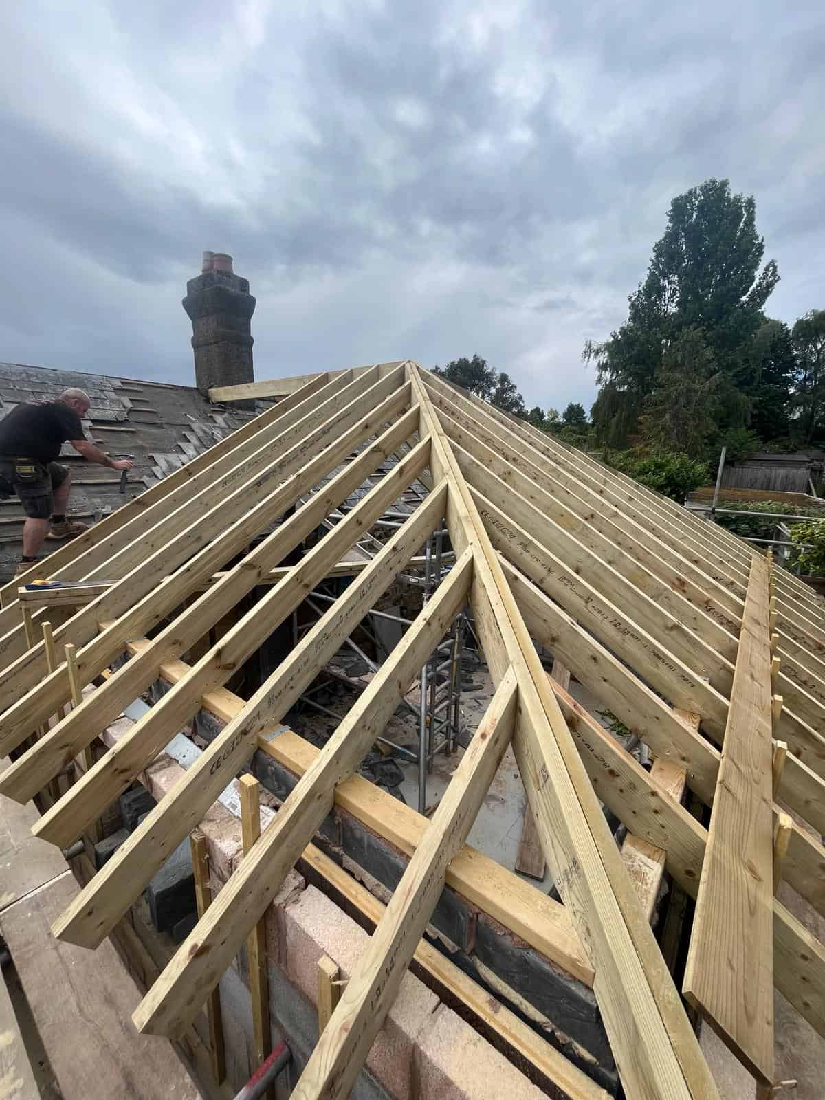 New roof construction with timber framing by JB Carpentry & Construction in the UK.