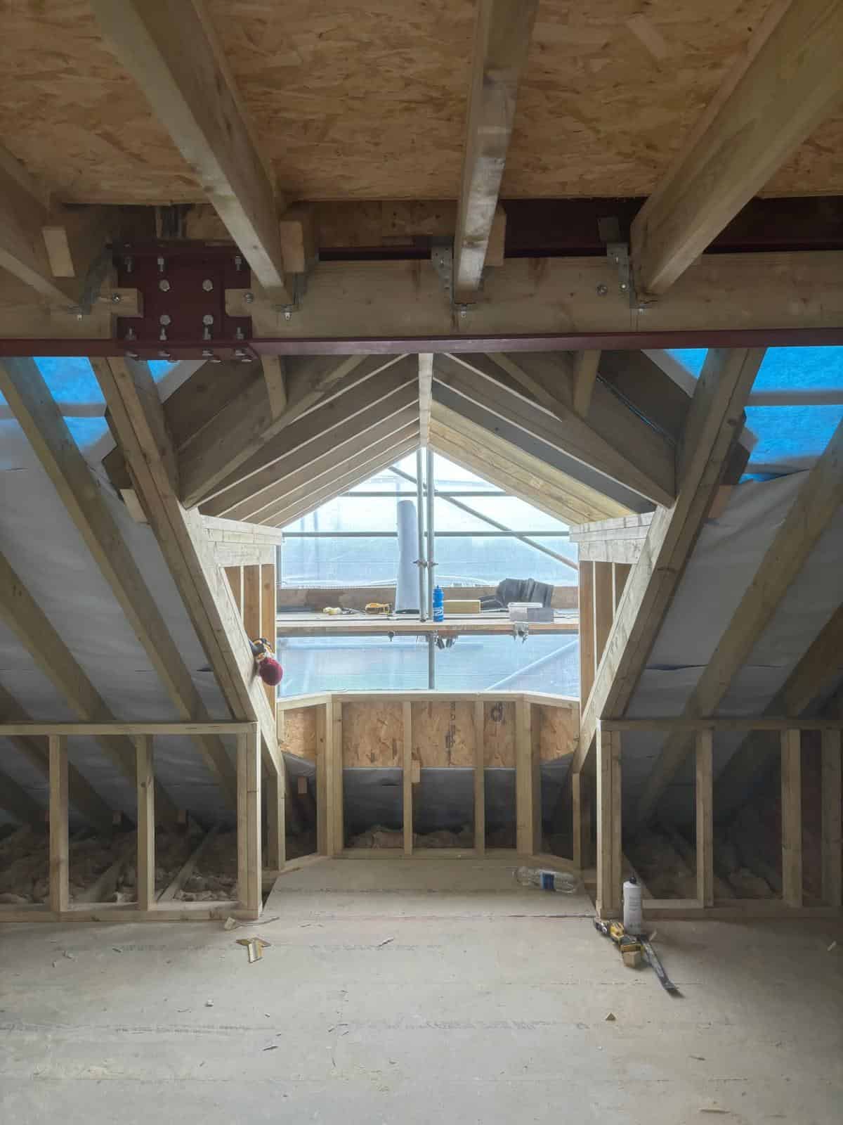 Timber roof construction in attic conversion by JB Carpentry & Construction.