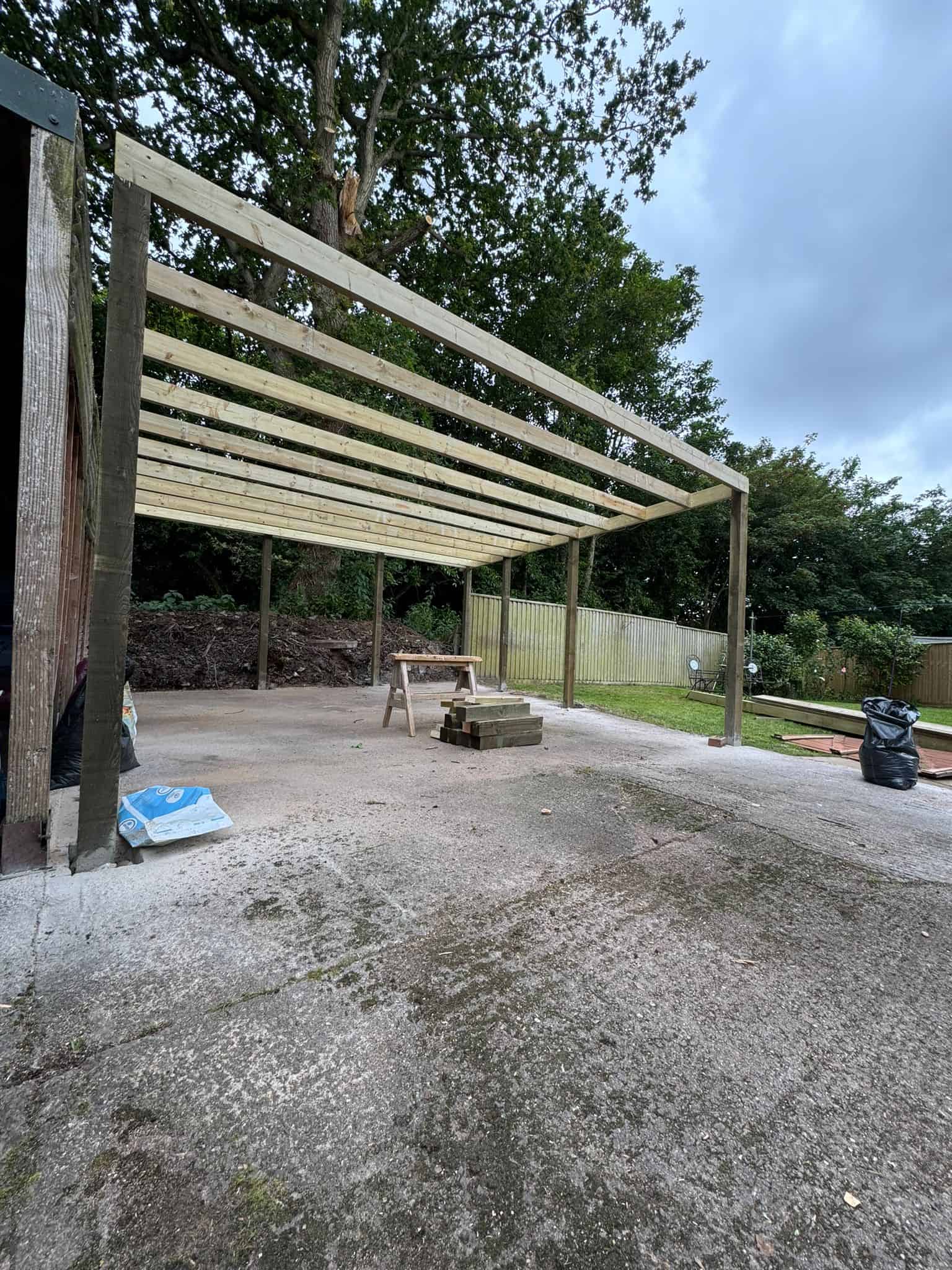 New wooden carport construction by JB Carpentry & Construction in progress.