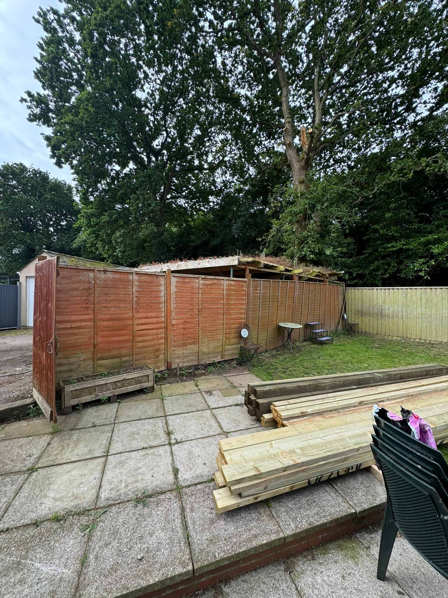 Panel fencing installation by JB Carpentry & Construction for garden privacy and boundary marking.