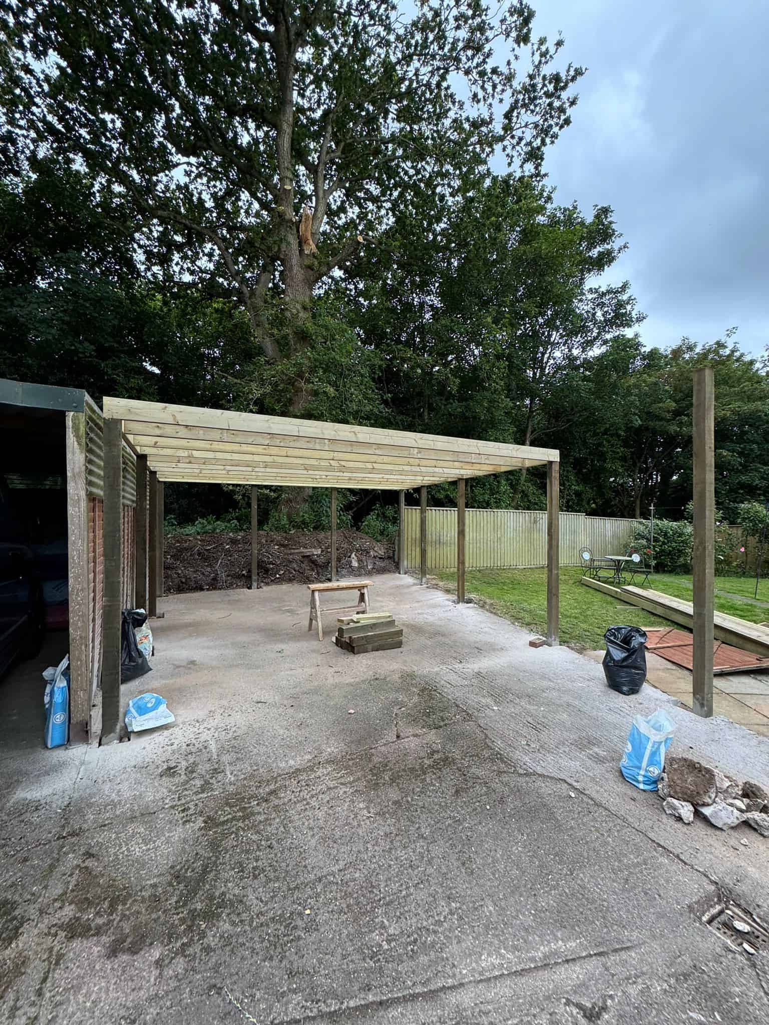 New wooden carport construction by JB Carpentry & Construction in progress.