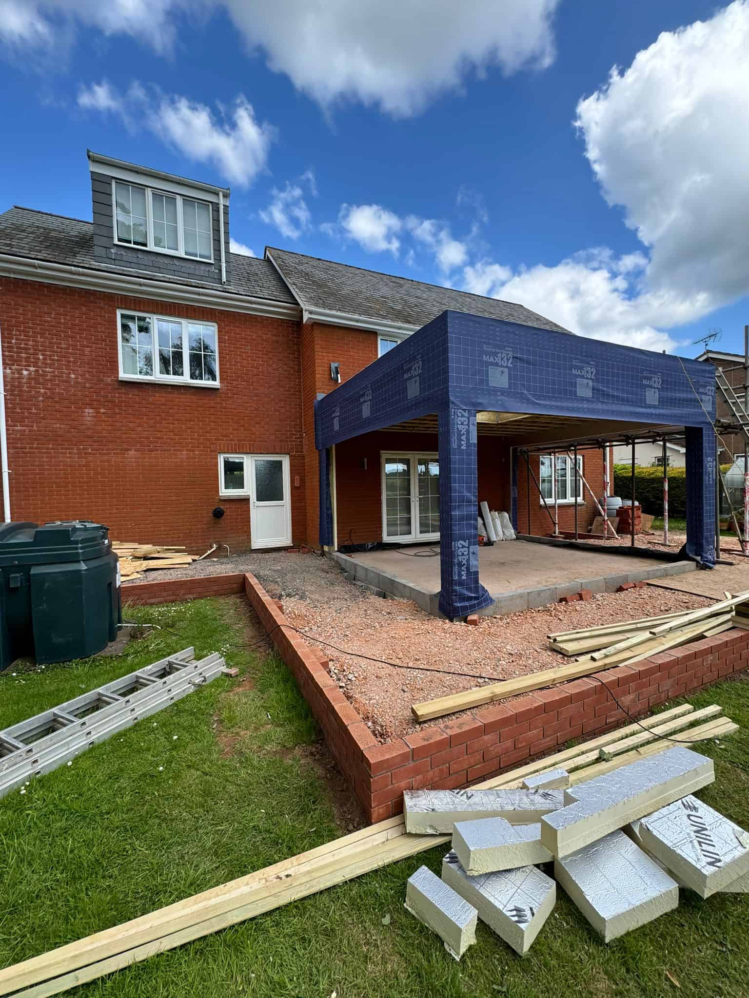 New patio extension under construction by JB Carpentry & Construction in UK.