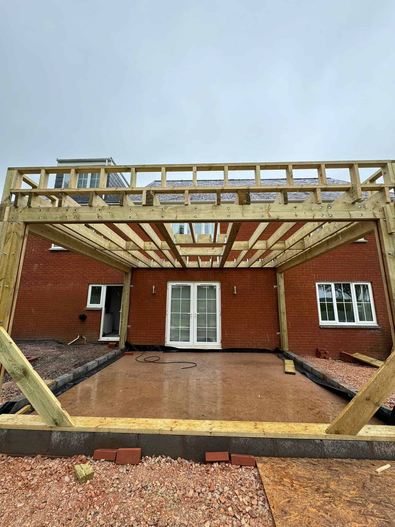 New timber balcony construction for a house extension by JB Carpentry & Construction. Expert carpentry services in the UK.