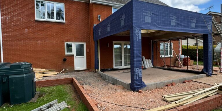 New patio extension under construction by JB Carpentry & Construction in UK.